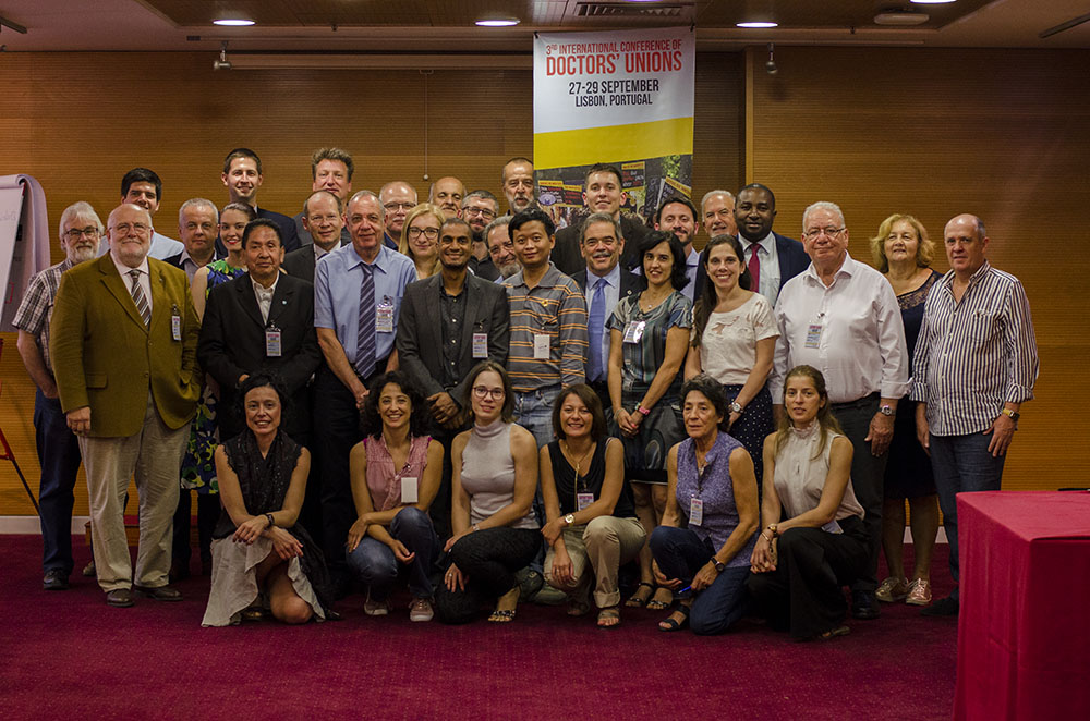 Fotografia de grupo da conferência